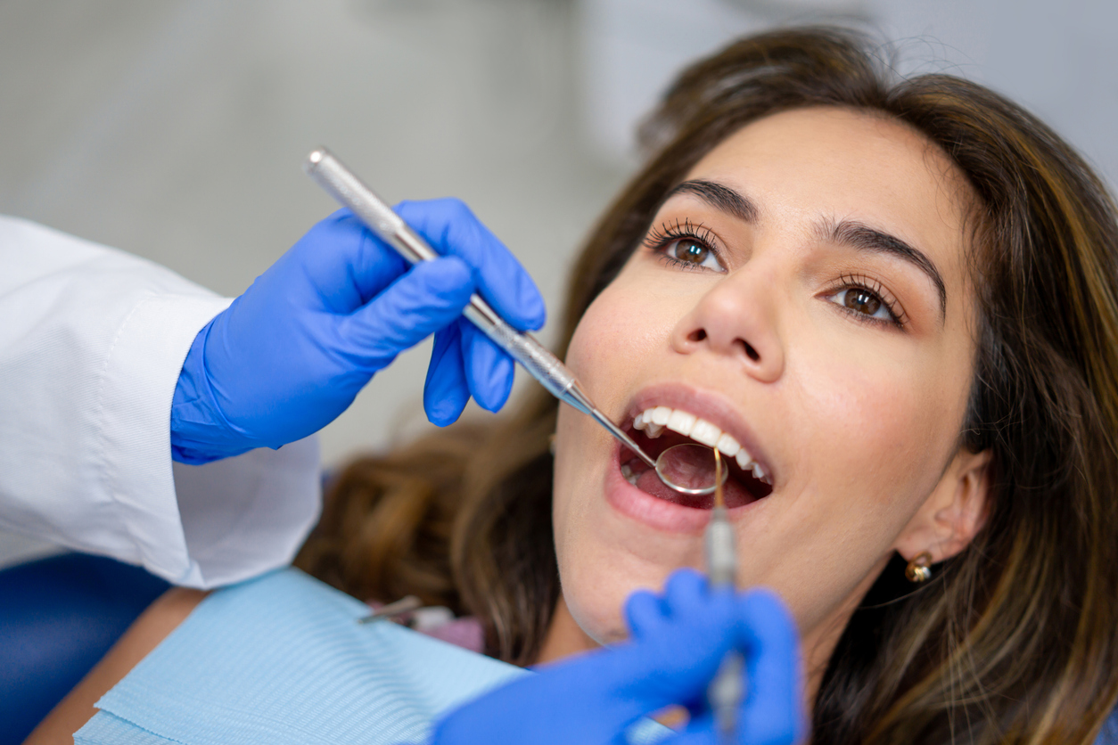 Trillium Dental patient receiving professional teeth cleaning