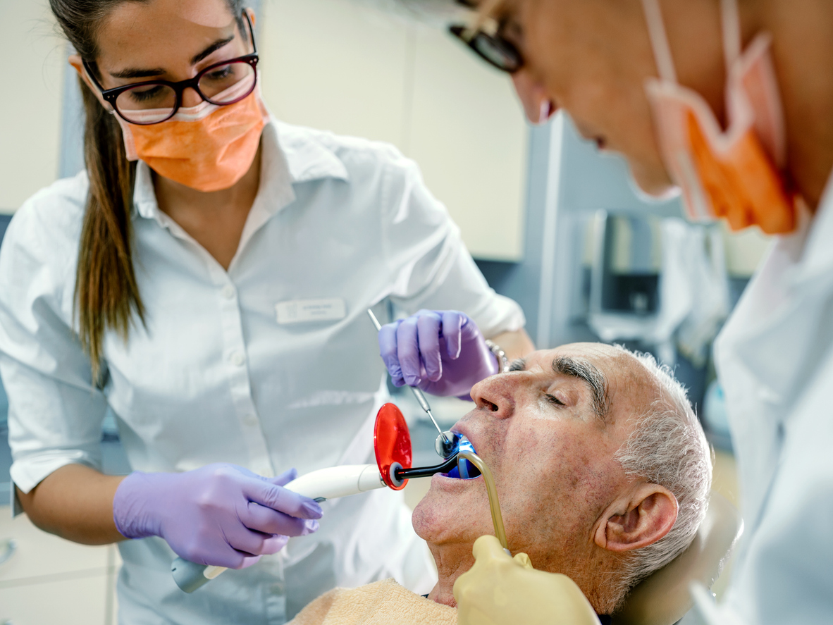 Smiling patient at a family dental clinic in Orléans