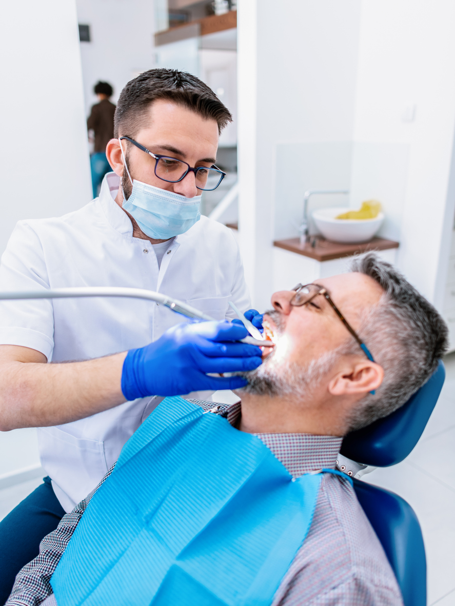 Smiling patient at a family dental clinic in Orléans
